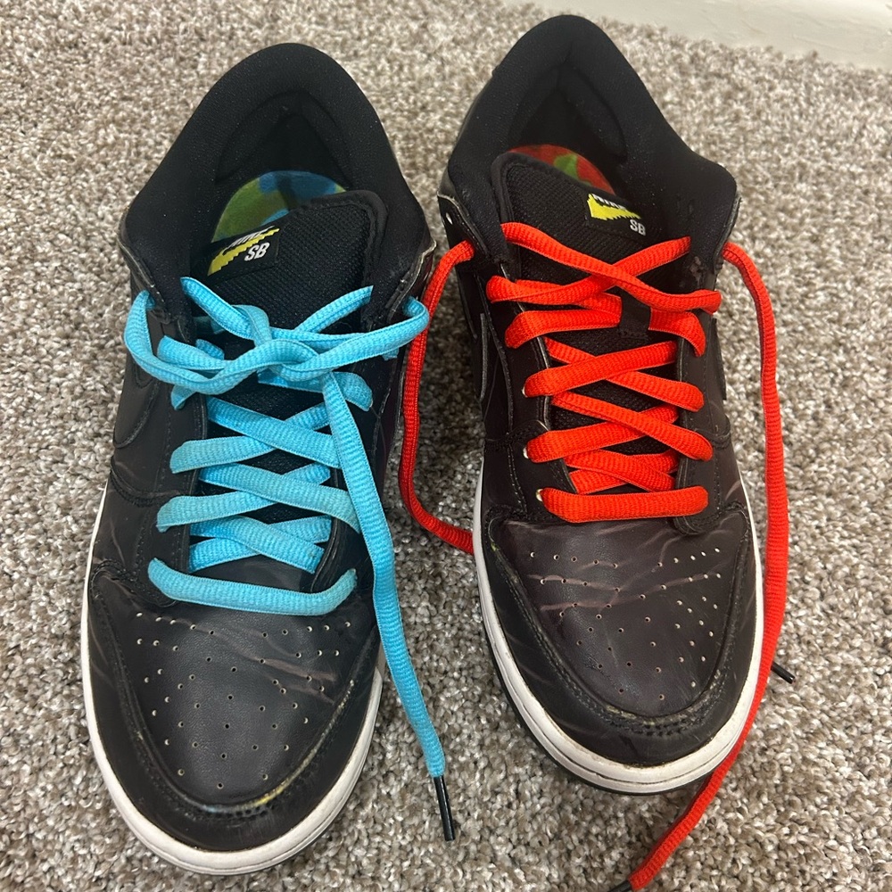 Nike Black Athletic Shoes with Blue and Red Accents